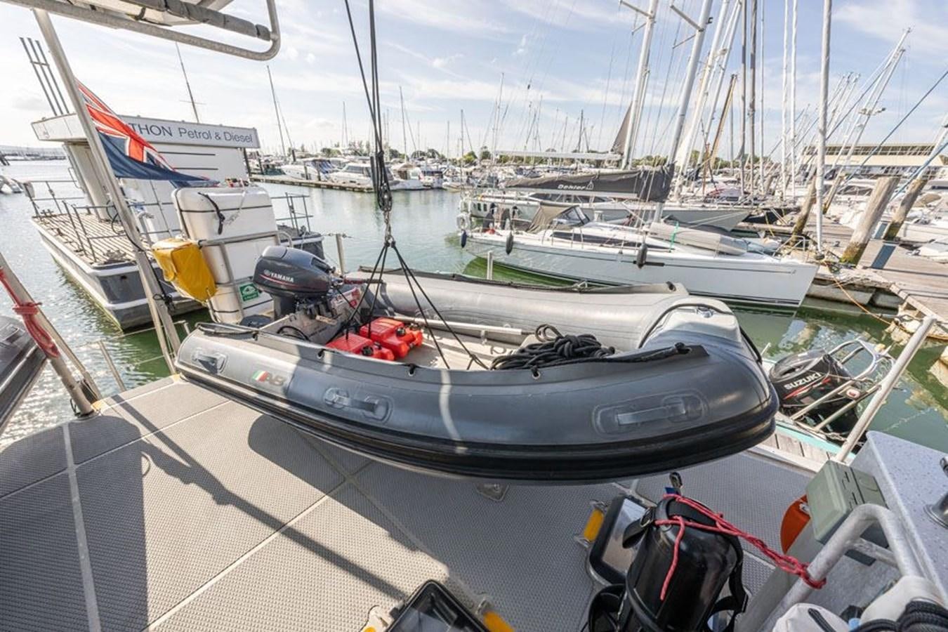 a boat docked at a pier aboard GREY WOLF Yacht for Sale