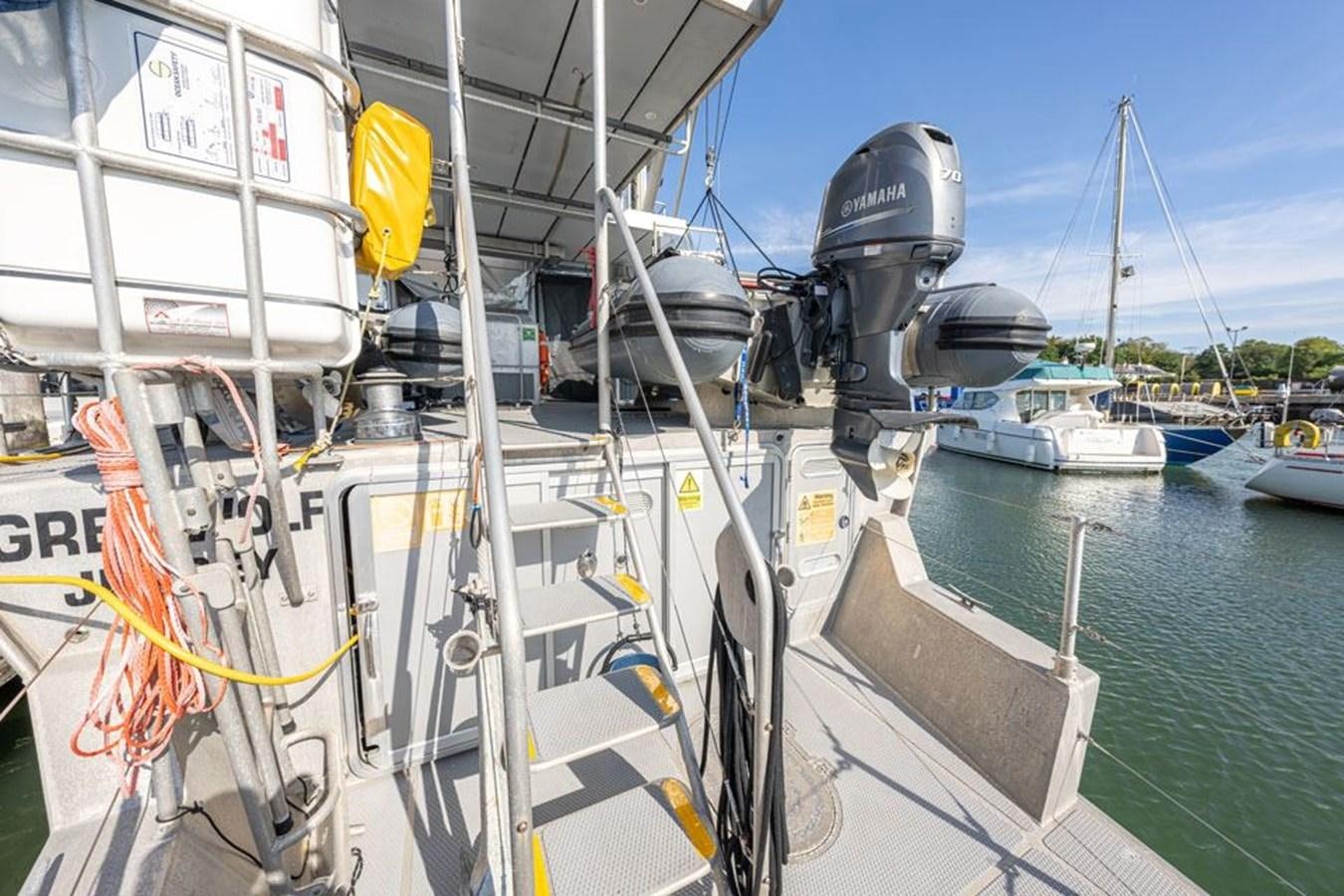 a boat with a large machine on the deck aboard GREY WOLF Yacht for Sale