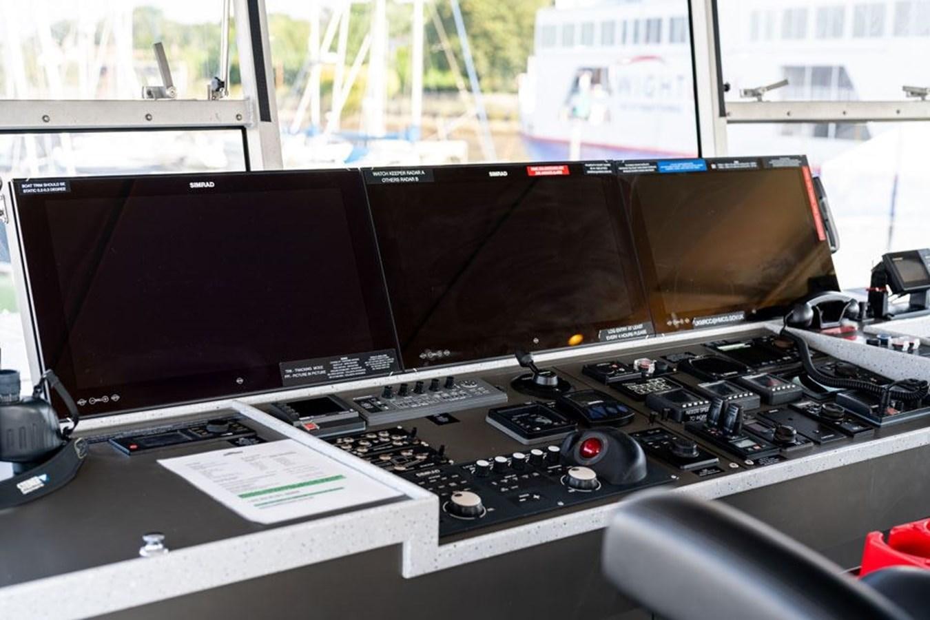 a computer on a desk aboard GREY WOLF Yacht for Sale