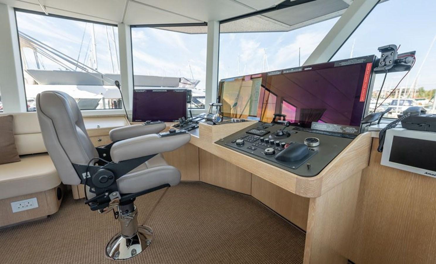 a room with a desk and a computer aboard GREY WOLF Yacht for Sale