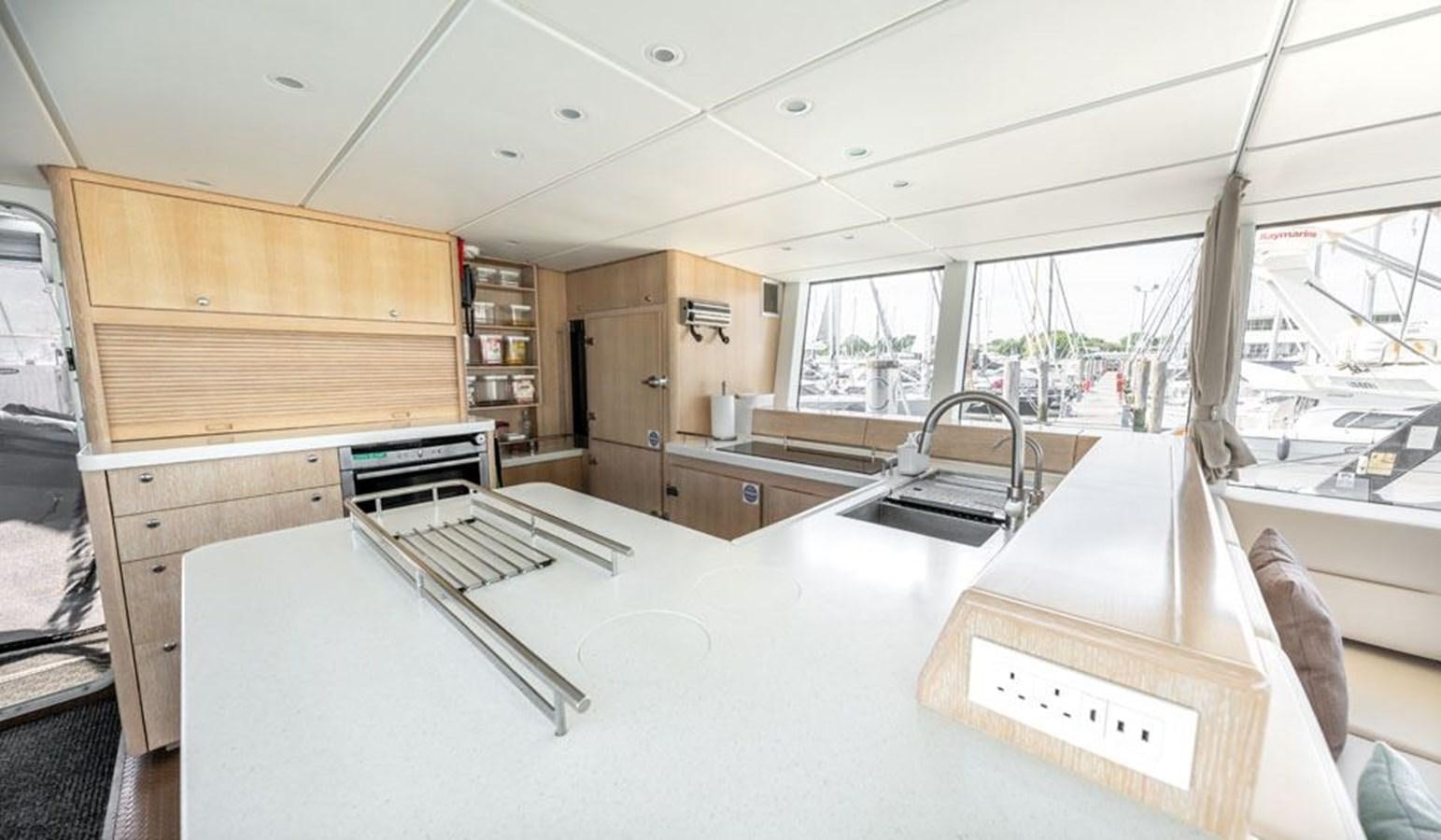 a room with a desk and a computer aboard GREY WOLF Yacht for Sale