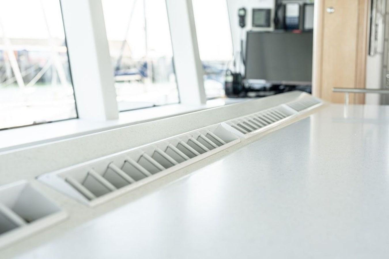 a white computer keyboard aboard GREY WOLF Yacht for Sale