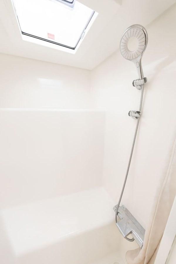 a white wall with a light aboard GREY WOLF Yacht for Sale