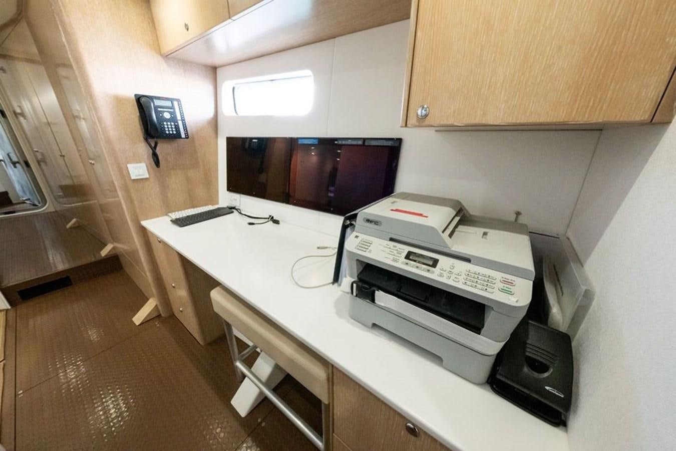 a printer on a table aboard GREY WOLF Yacht for Sale