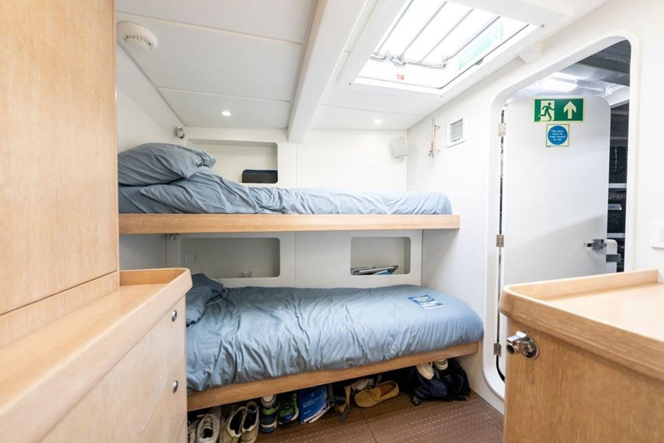 a hospital room with bunk beds aboard GREY WOLF Yacht for Sale