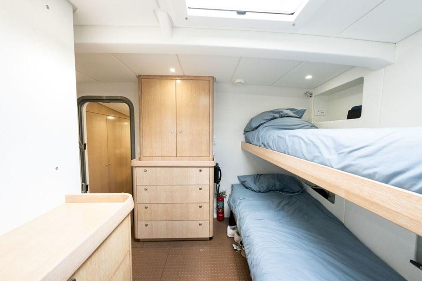 a room with two beds aboard GREY WOLF Yacht for Sale