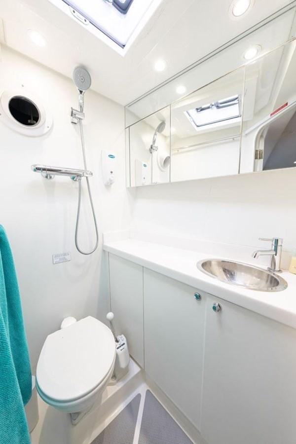 a bathroom with a sink and a toilet aboard GREY WOLF Yacht for Sale