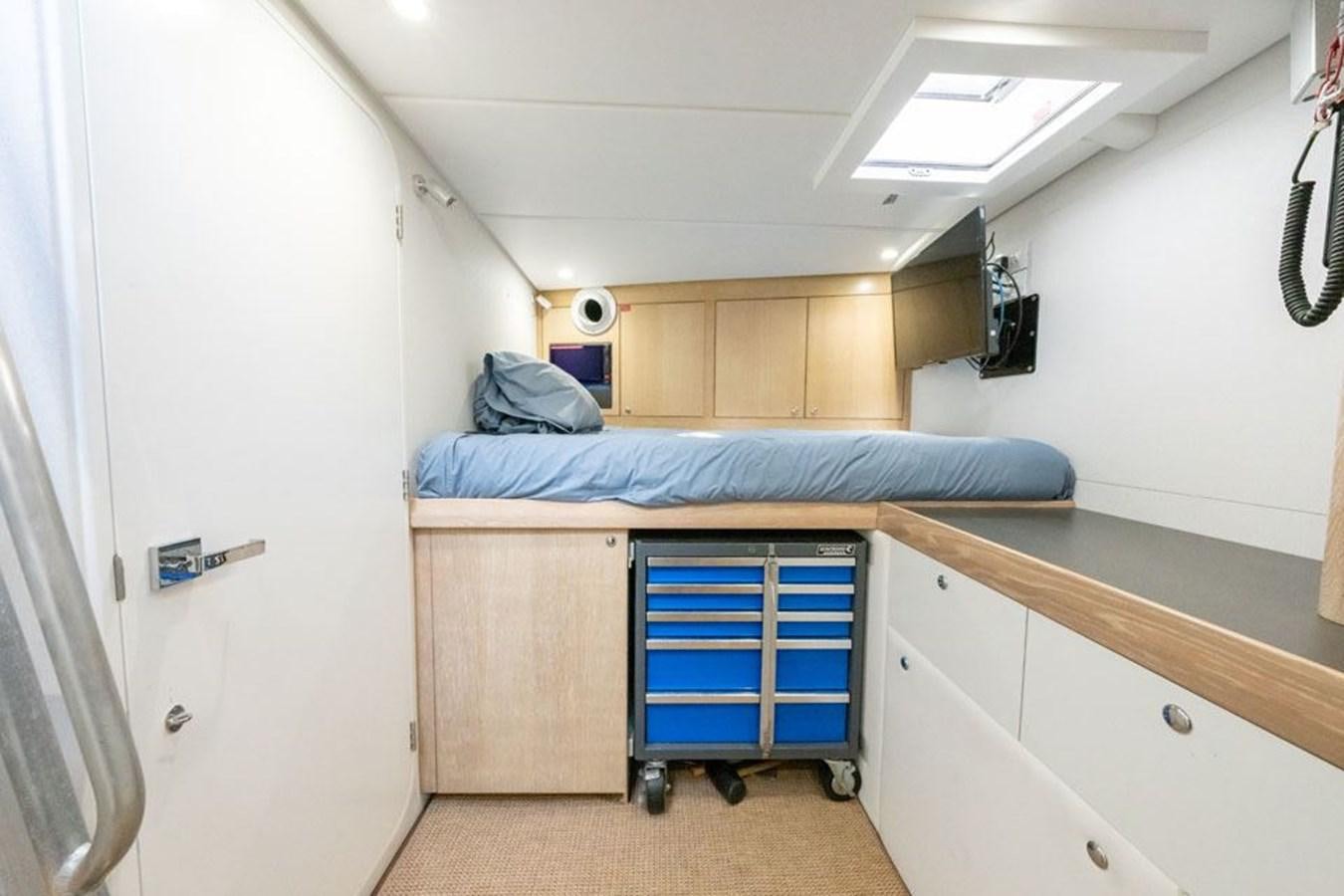 a bed in a room aboard GREY WOLF Yacht for Sale