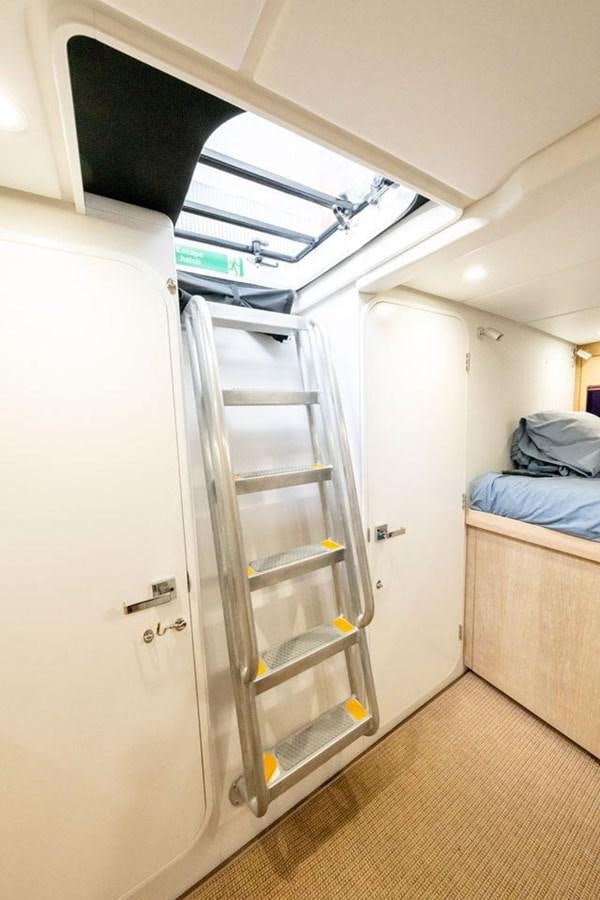 a bunk bed in a room aboard GREY WOLF Yacht for Sale