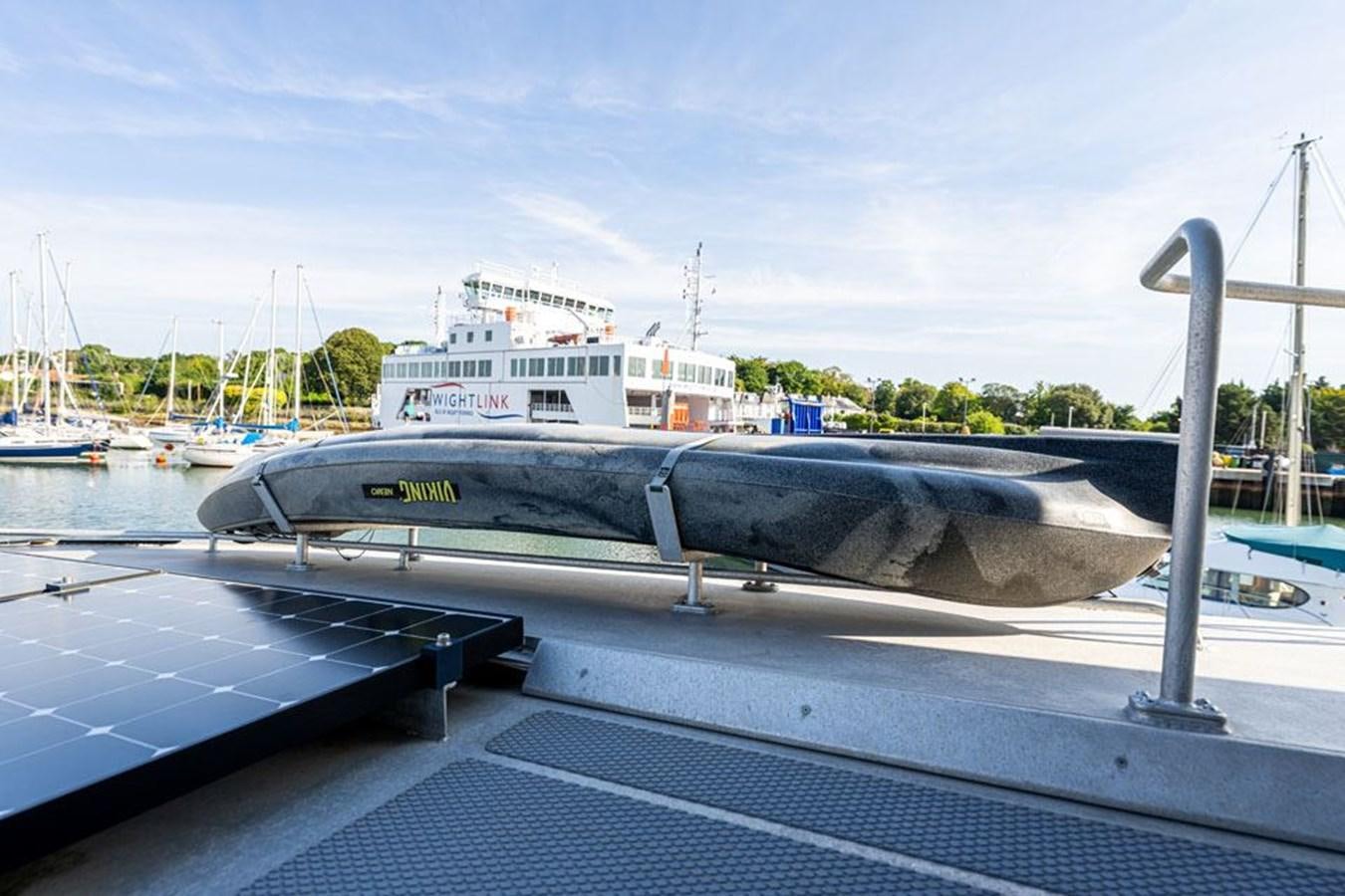 a boat on a dock aboard GREY WOLF Yacht for Sale
