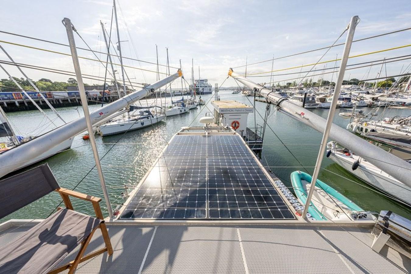 a dock with many boats aboard GREY WOLF Yacht for Sale