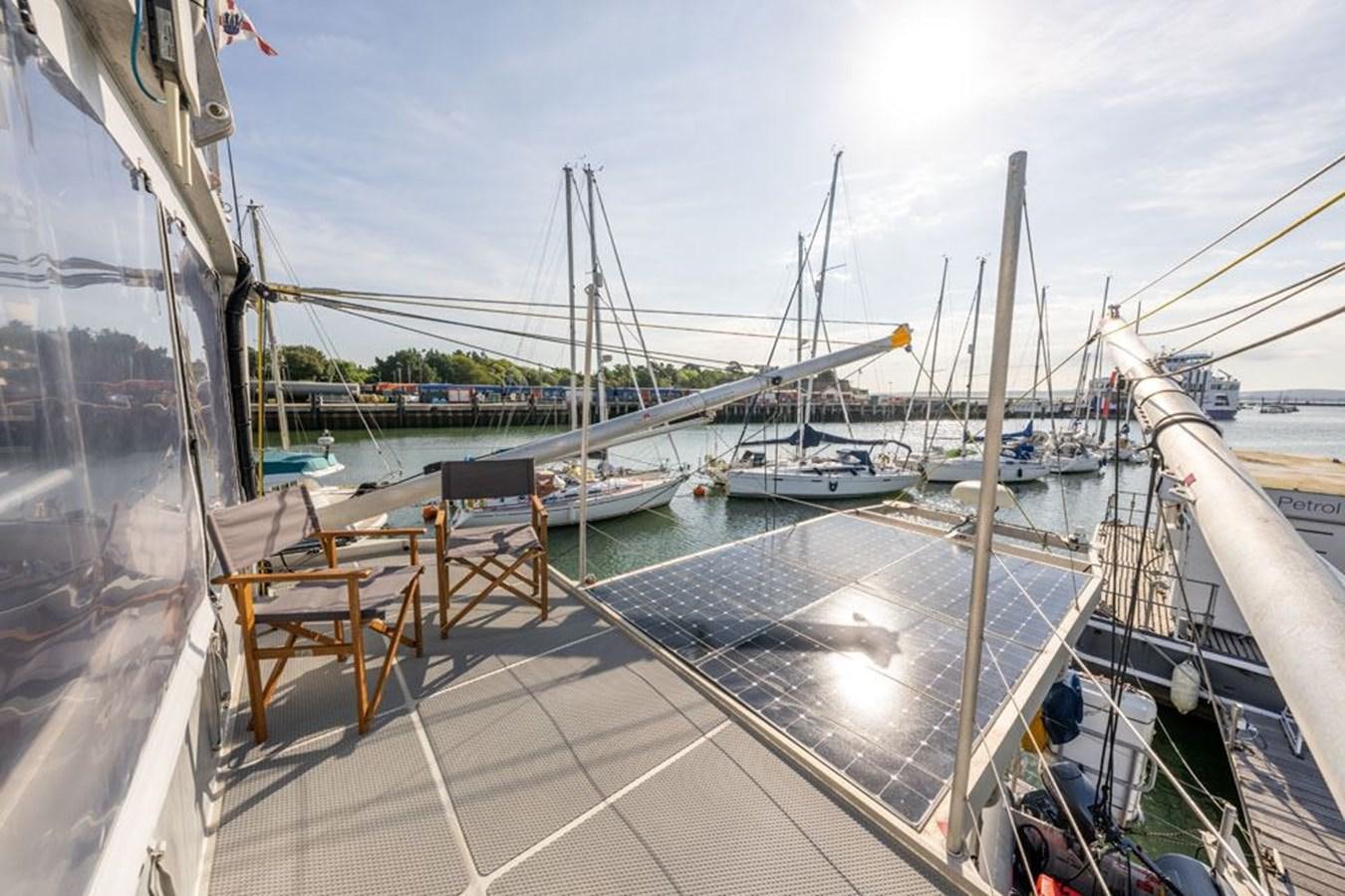 a dock with boats aboard GREY WOLF Yacht for Sale