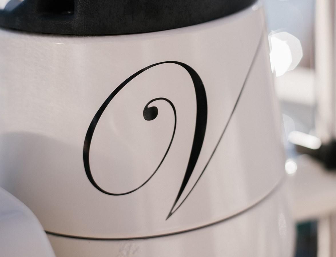 a white speaker with a black circle on it aboard VINTAGE I Yacht for Sale