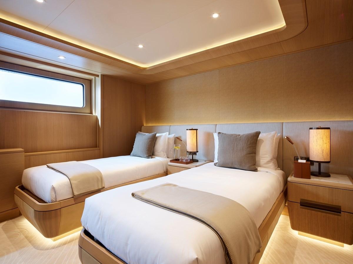 a room with two beds aboard COME TOGETHER Yacht for Charter