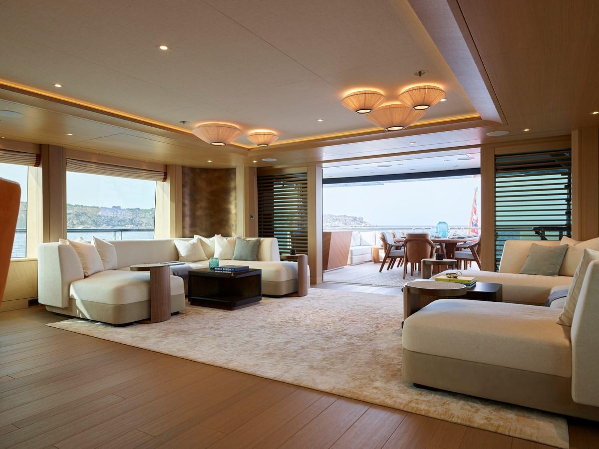 a living room with a large window aboard COME TOGETHER Yacht for Charter
