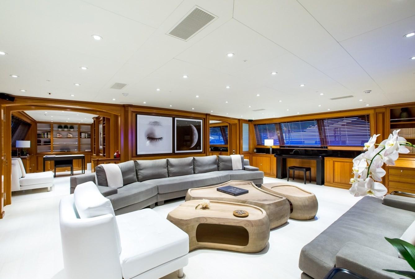 a living room with a couch and a tv aboard PERSEUS Yacht for Sale