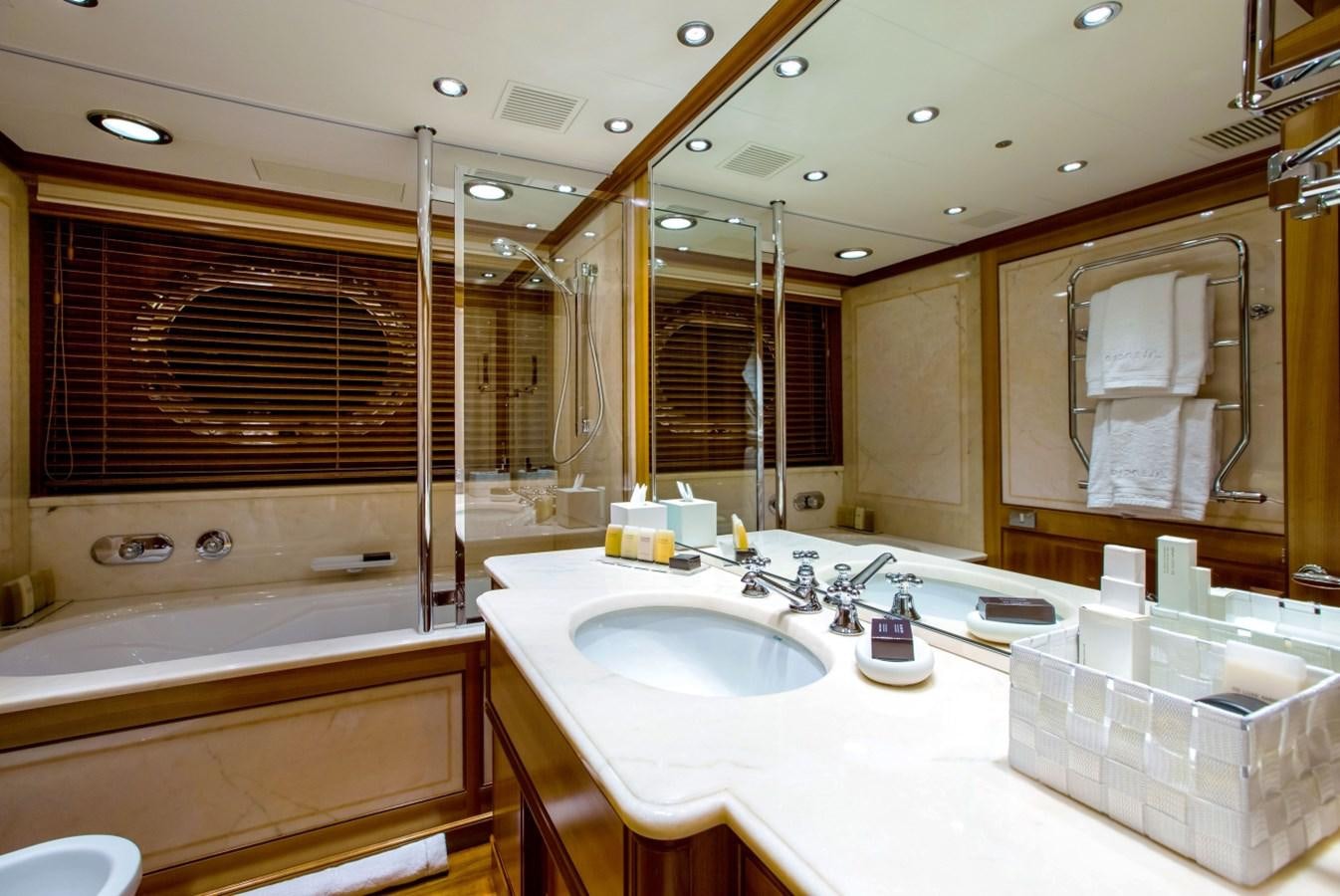 a bathroom with a large mirror aboard PERSEUS Yacht for Charter