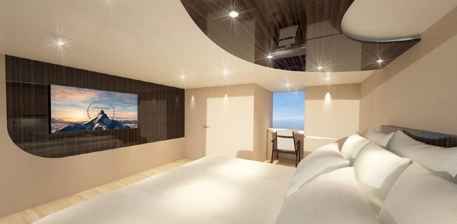 a room with a bed and a tv on the wall aboard  ILC Yacht for Sale