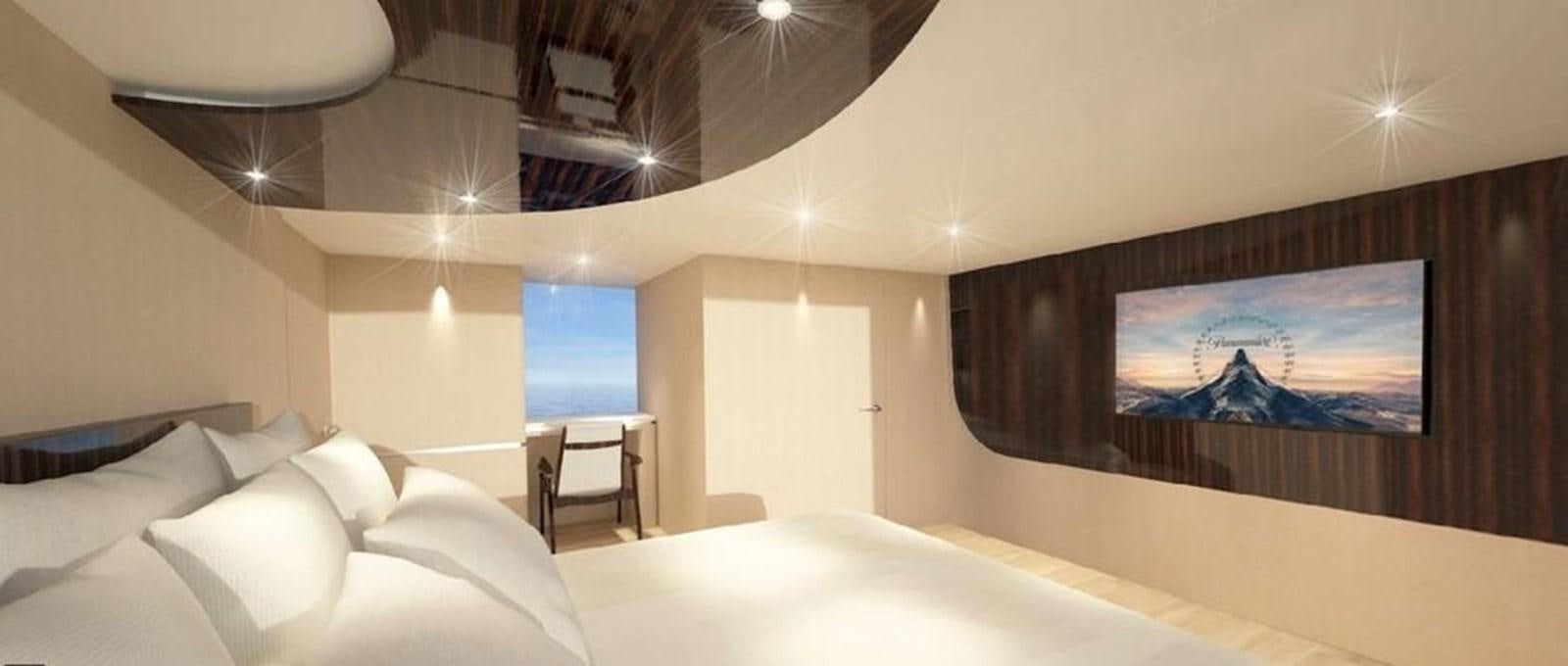 a room with a bed and a television aboard  ILC Yacht for Sale