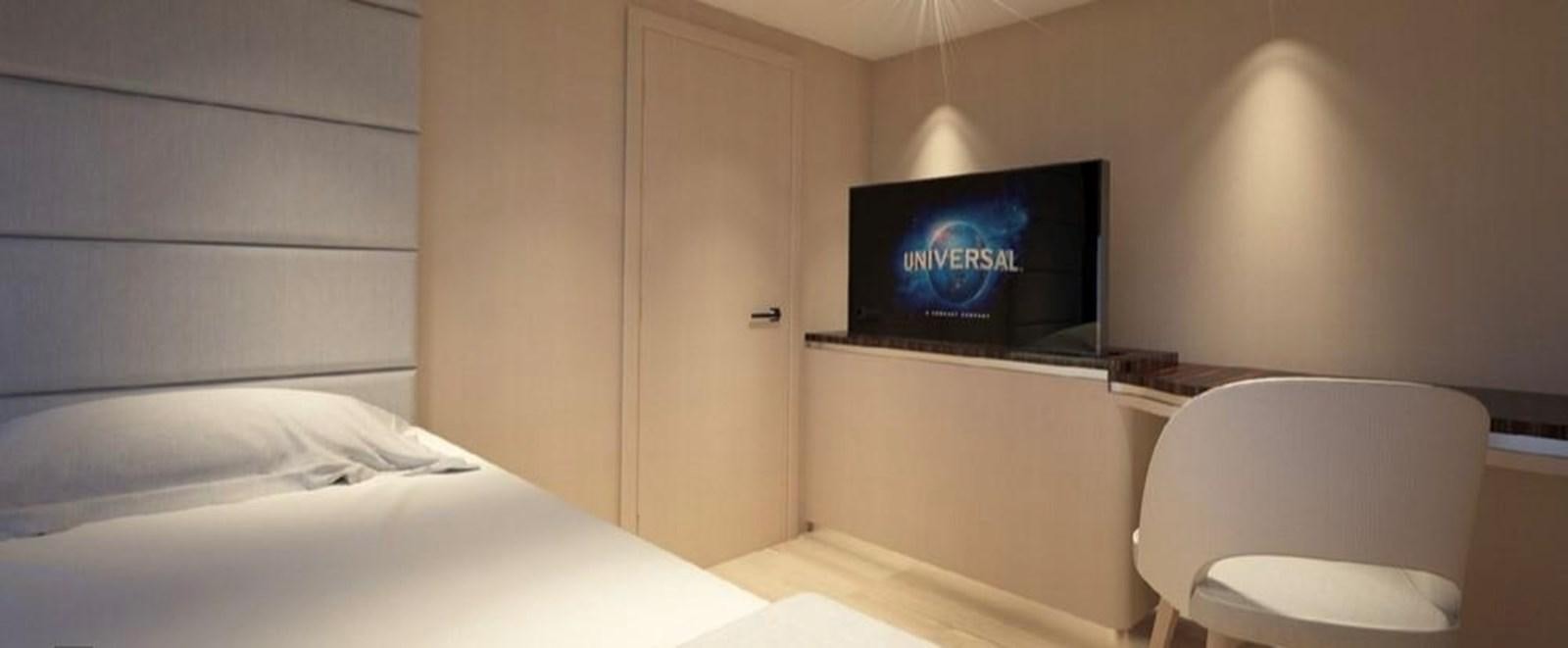 a tv on a wall aboard  ILC Yacht for Sale