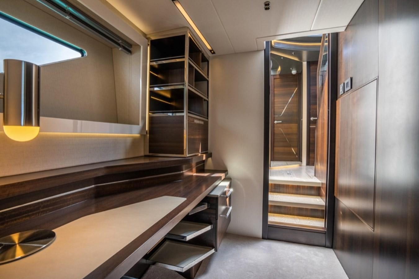 a room with a glass door and a glass wall aboard FORZA Yacht for Sale