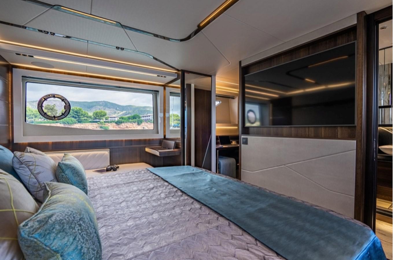 a bed in a room aboard FORZA Yacht for Sale