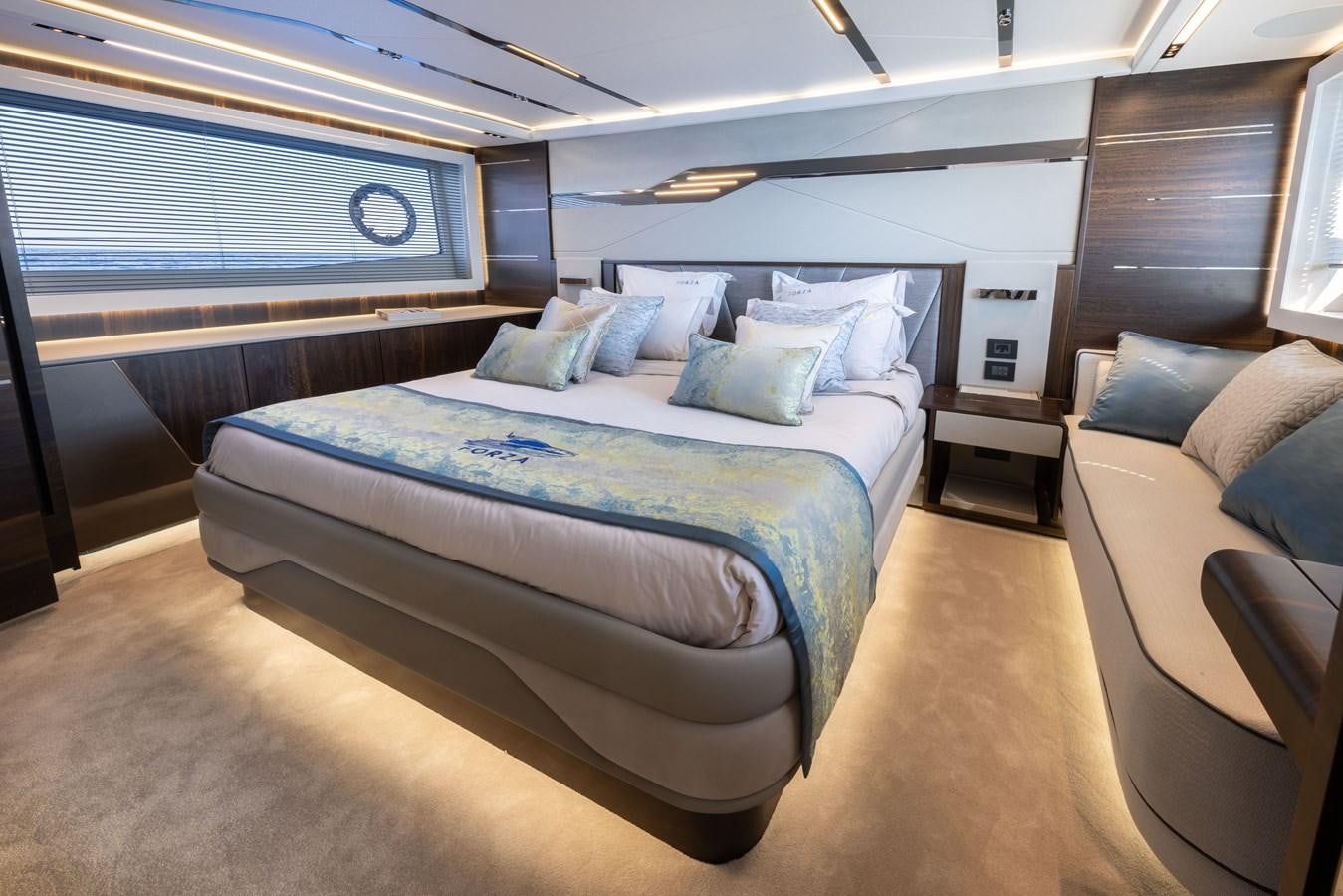 a bed in a room aboard FORZA Yacht for Sale