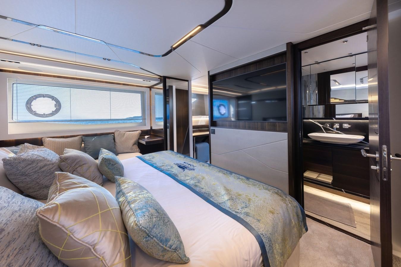 a bed in a room aboard FORZA Yacht for Sale