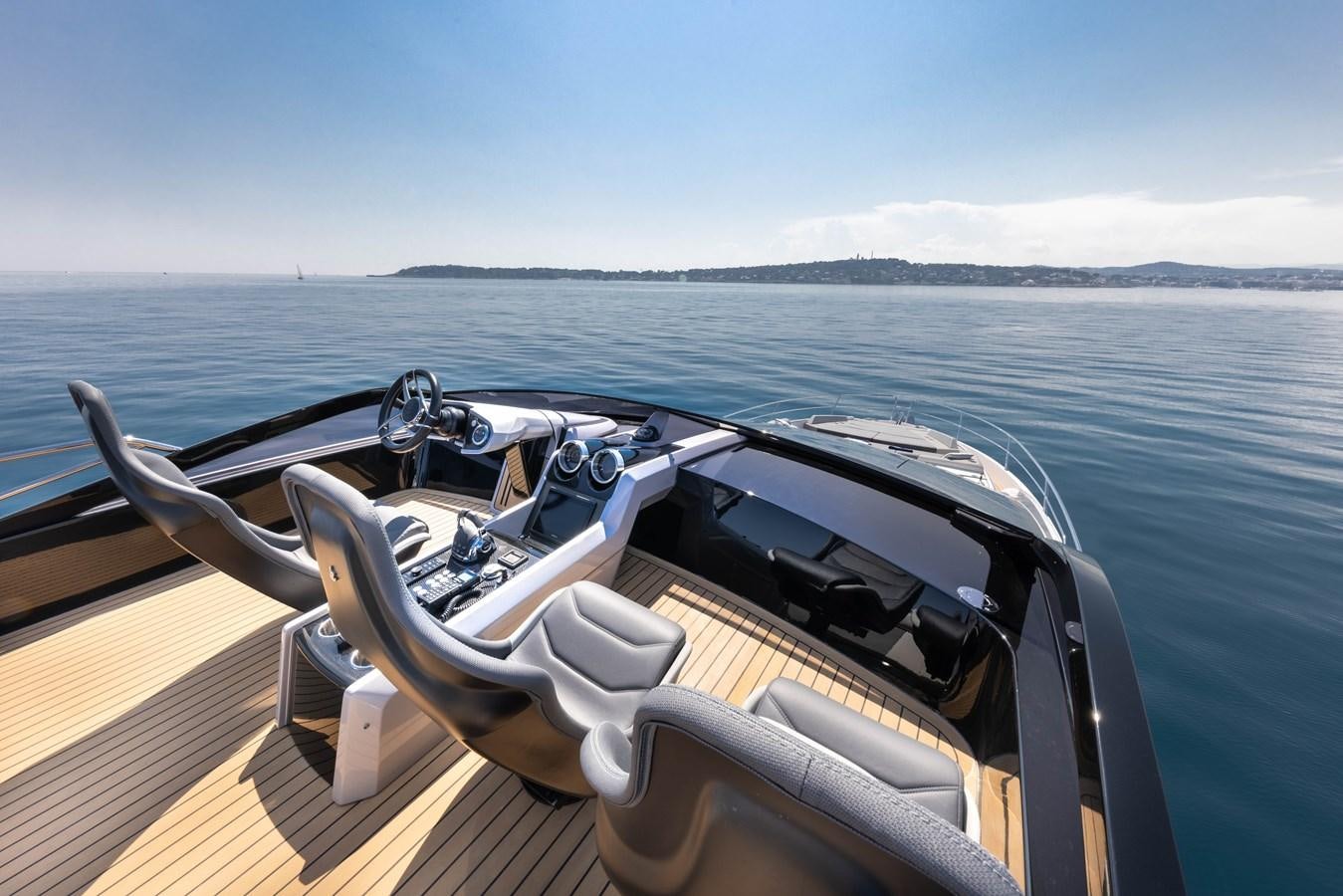 a boat with a steering wheel aboard FORZA Yacht for Sale