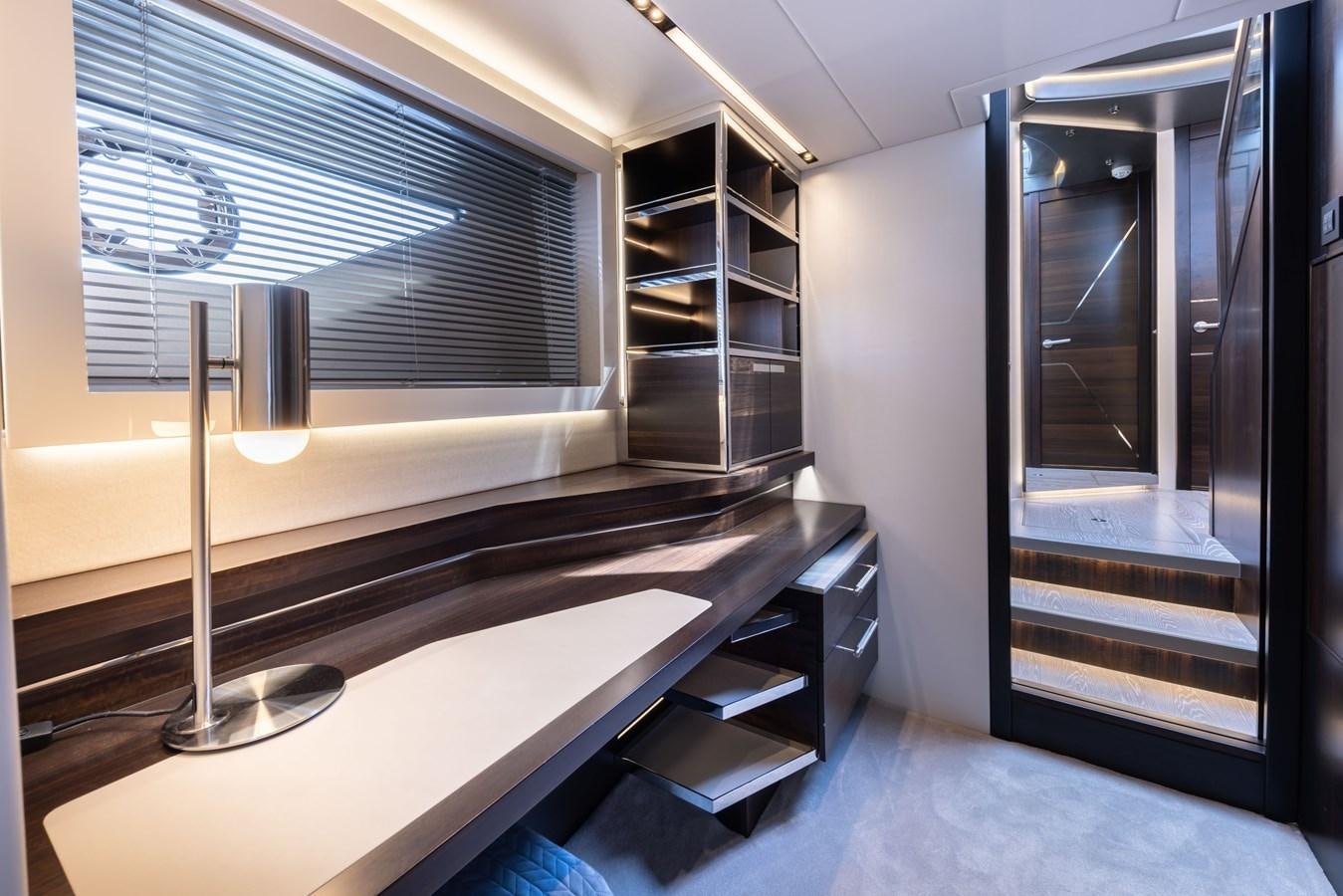 a room with a glass door and a glass wall with a glass window aboard FORZA Yacht for Sale