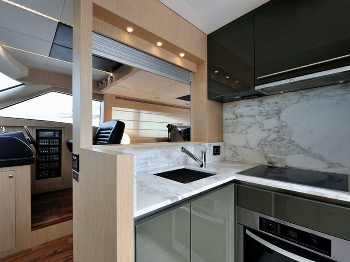 a kitchen with a large oven aboard AUSTIN PARKER - 72 FLY Yacht for Sale