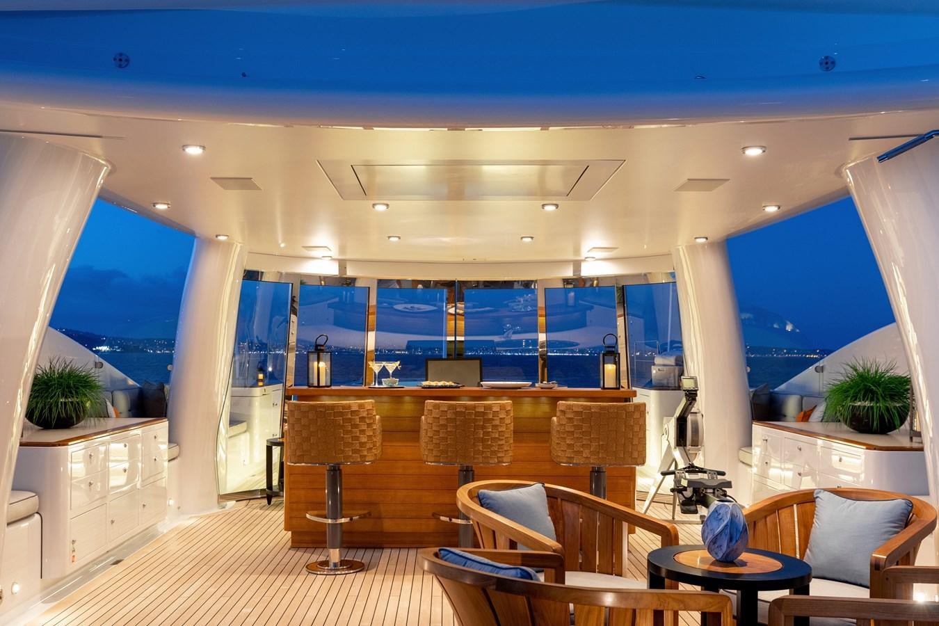 a room with a large window and a view of the ocean aboard LIND Yacht for Sale
