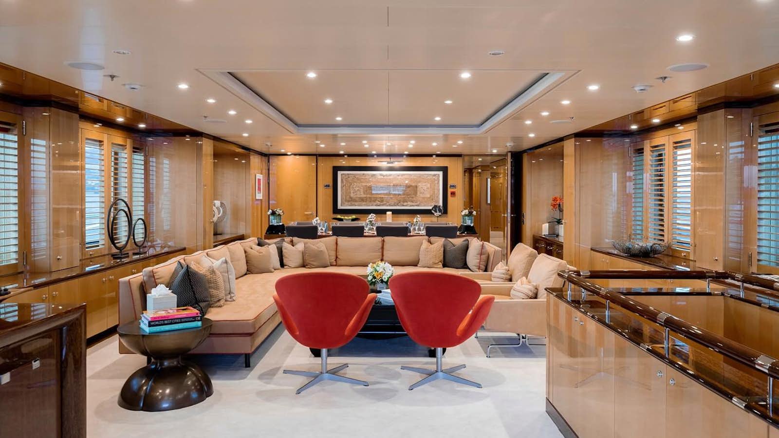 a large living room with a large open floor plan aboard LIND Yacht for Sale