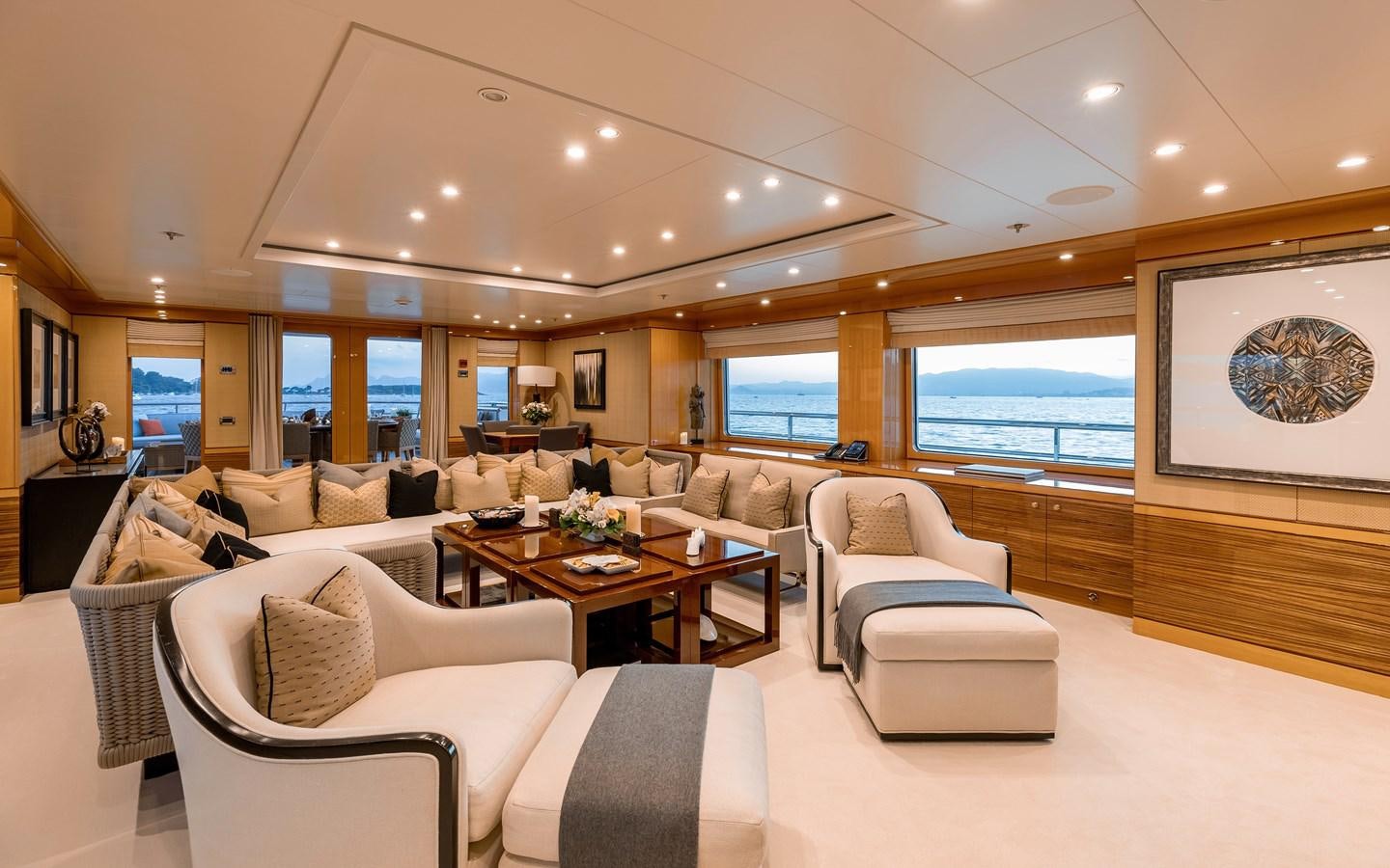 a living room with a large window aboard LIND Yacht for Sale