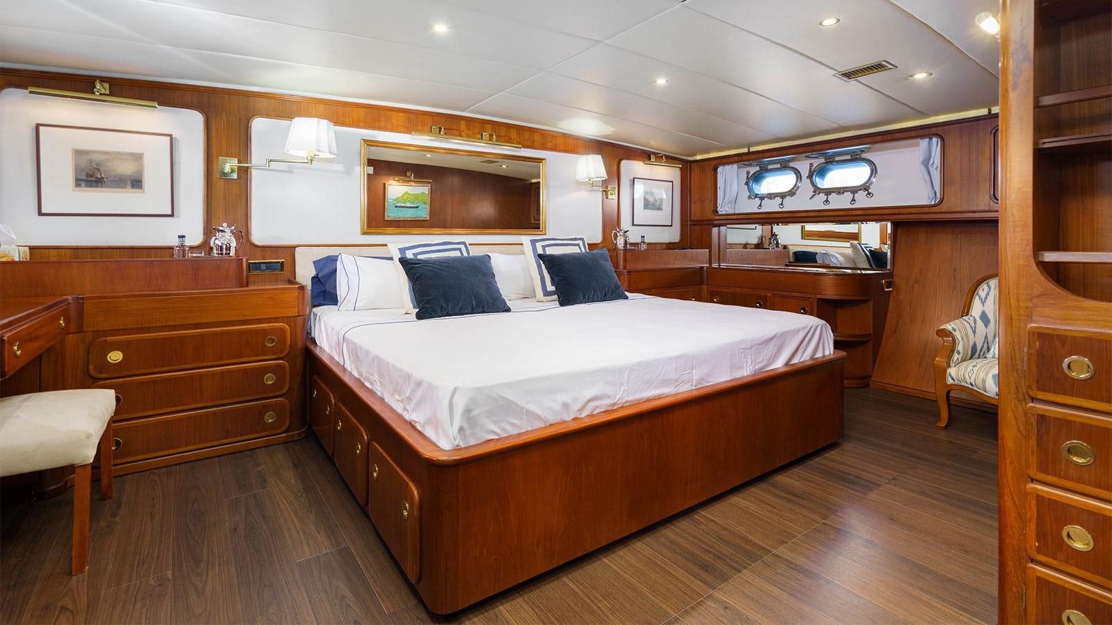 a large bed in a room aboard SPIRIT OF MK Yacht for Sale
