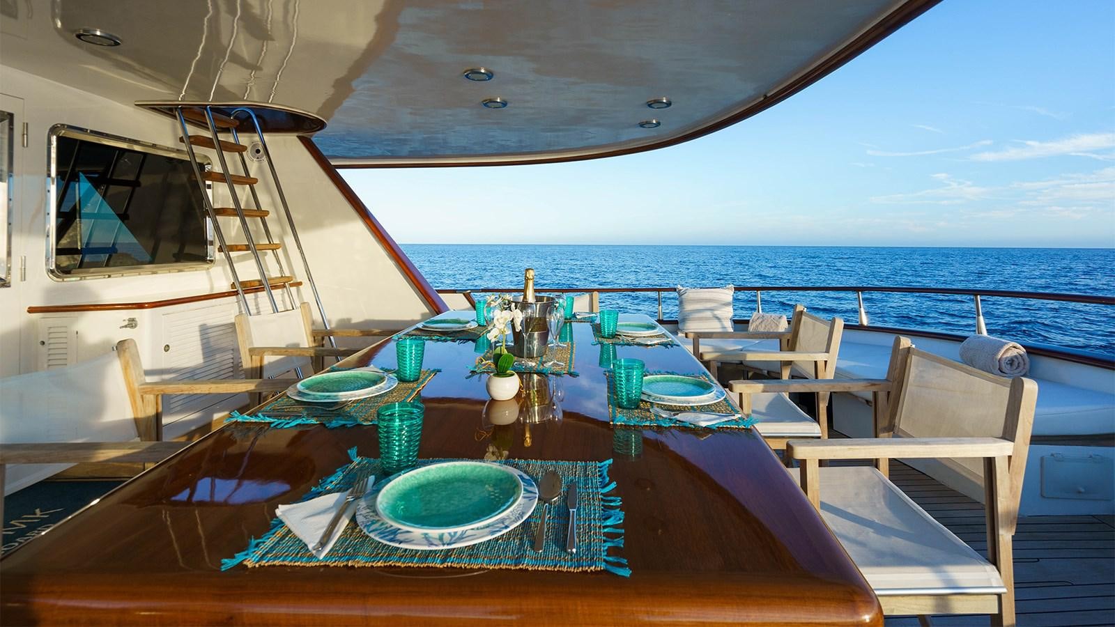 a table on a boat aboard SPIRIT OF MK Yacht for Charter