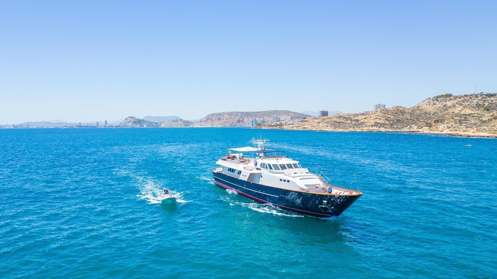 a couple of boats on the water aboard SPIRIT OF MK Yacht for Sale