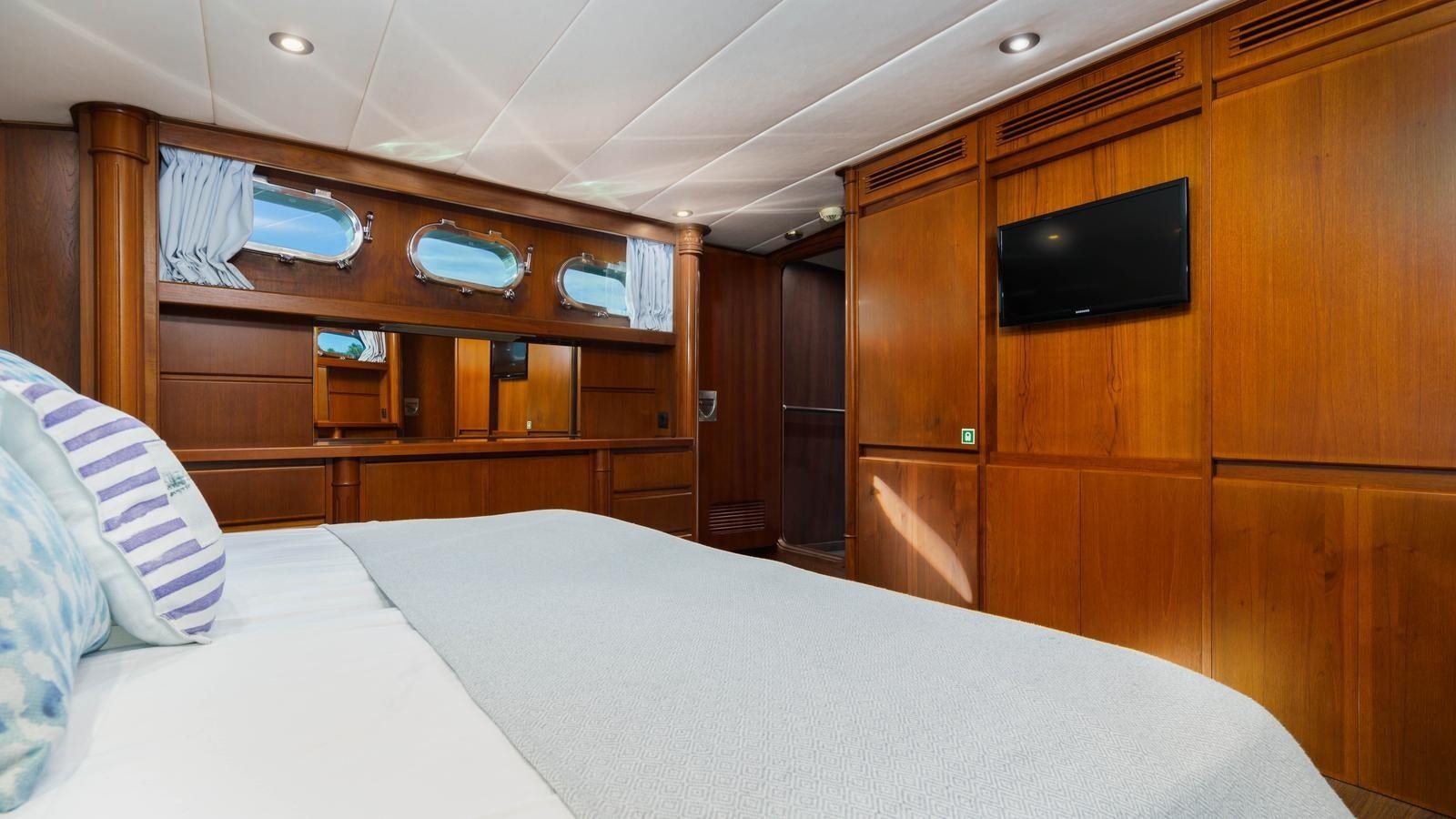 a bed in a room aboard SPIRIT OF MK Yacht for Sale