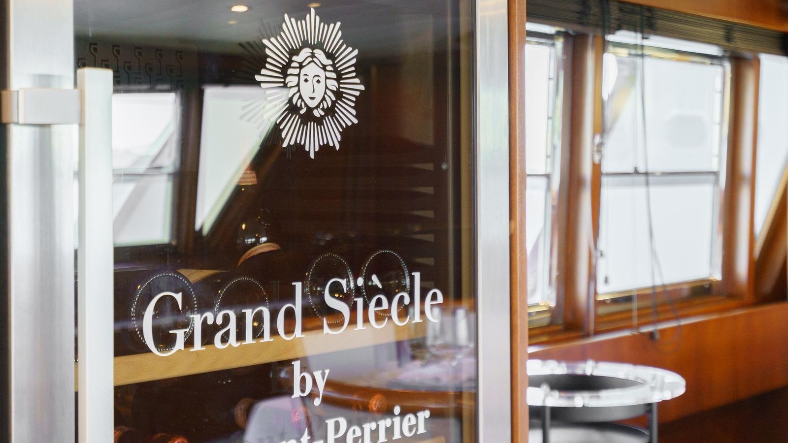 a glass door with a design on it aboard SPIRIT OF MK Yacht for Sale