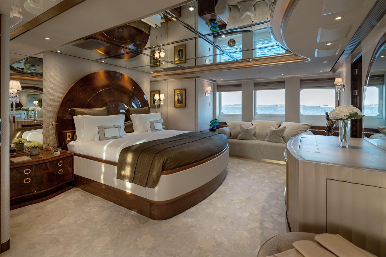 a large bedroom with a large bed aboard ALFA G Yacht for Sale