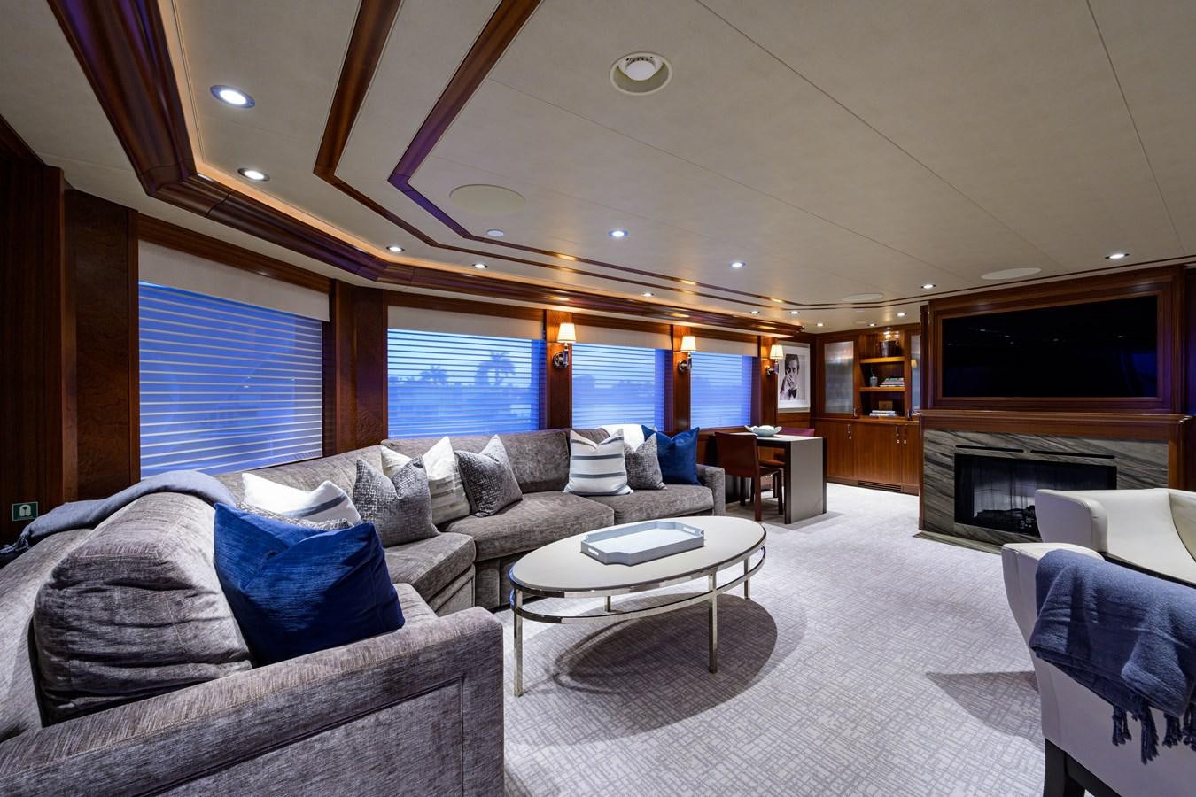 a living room with a large window aboard LADY JJ Yacht for Charter