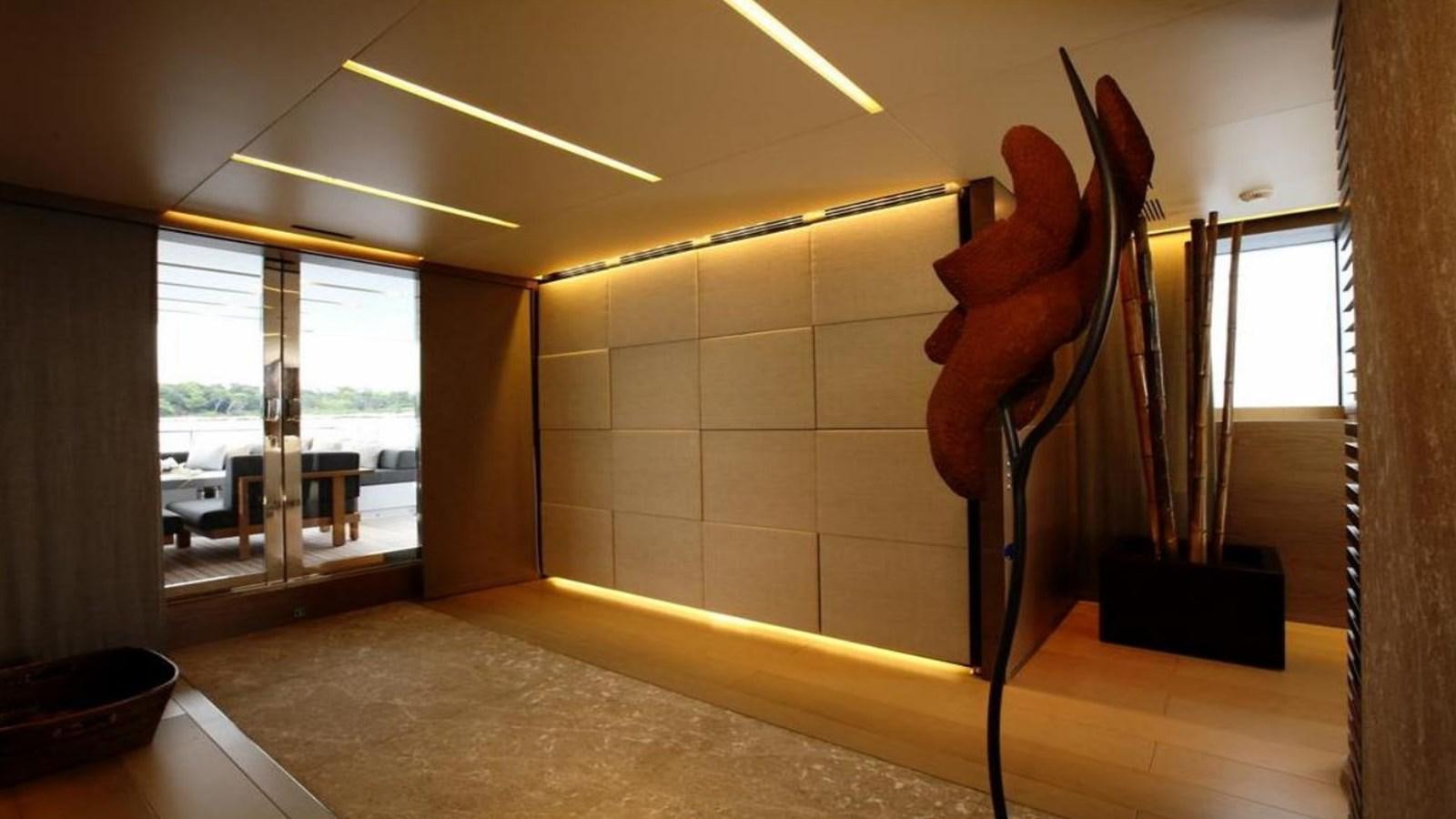 a large sculpture in a room aboard NAIA Yacht for Sale