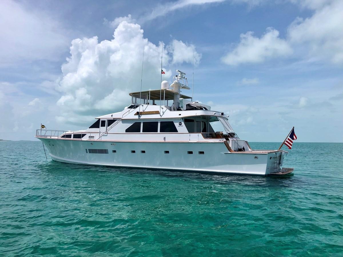 a boat in the water aboard CAPTIVATOR Yacht for Sale