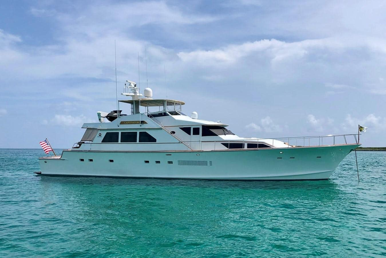 a boat in the water aboard CAPTIVATOR Yacht for Sale