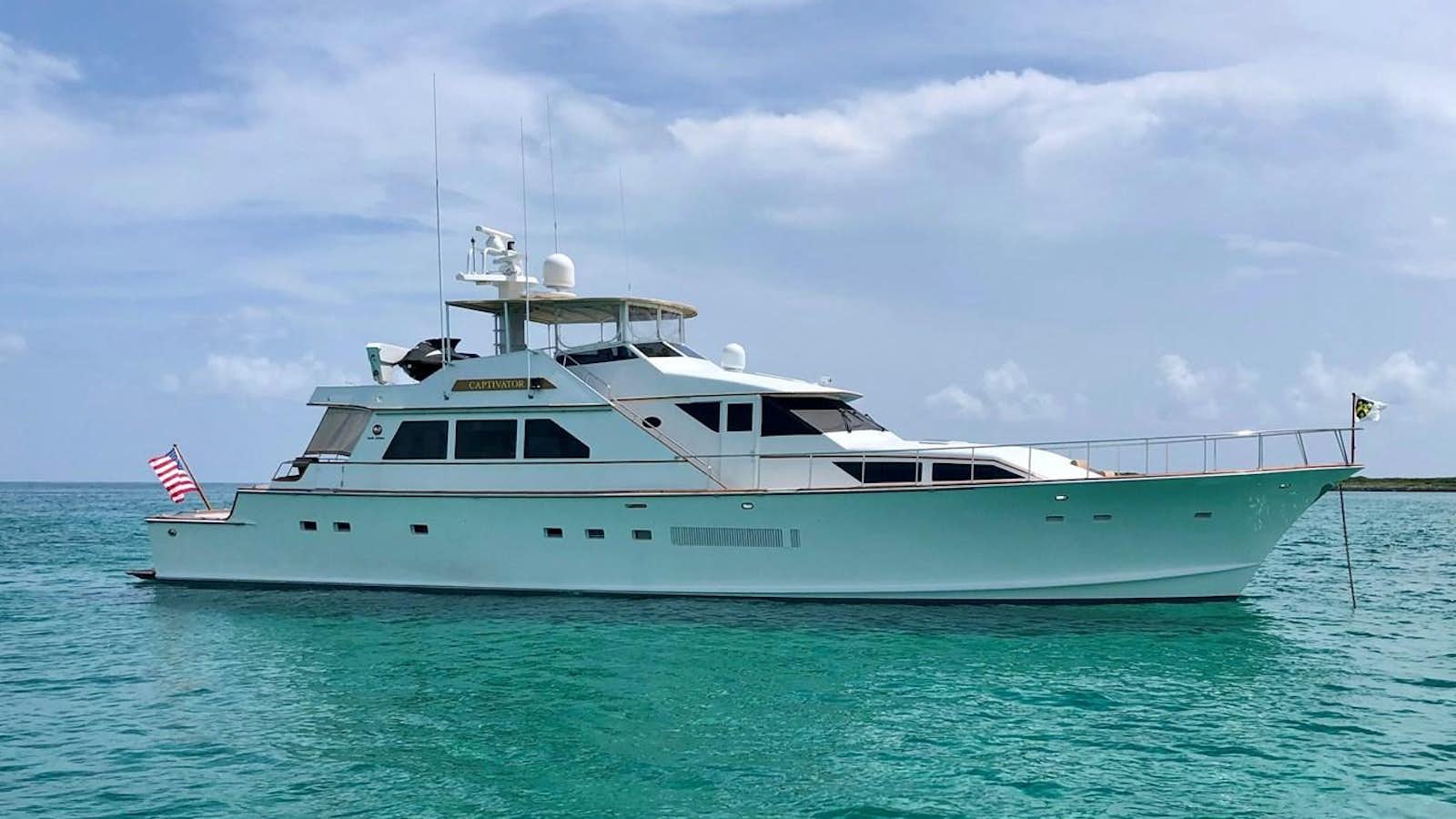 a boat in the water aboard CAPTIVATOR Yacht for Sale