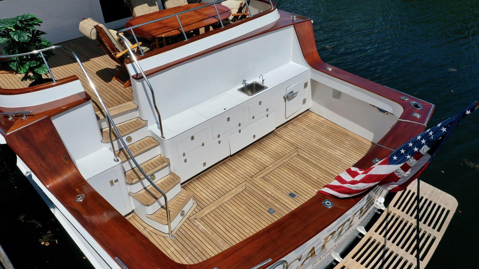 a boat on the water aboard CAPTIVATOR Yacht for Sale