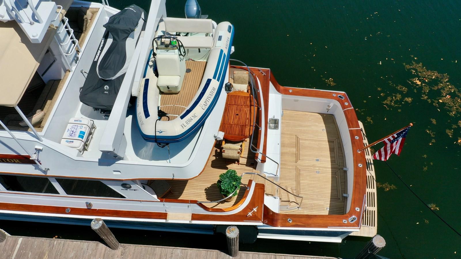 a boat on the water aboard CAPTIVATOR Yacht for Sale