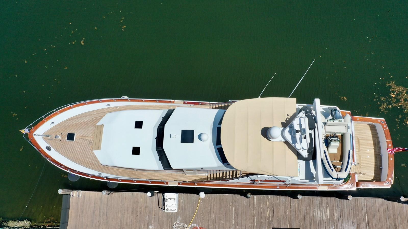 a boat on the water aboard CAPTIVATOR Yacht for Sale