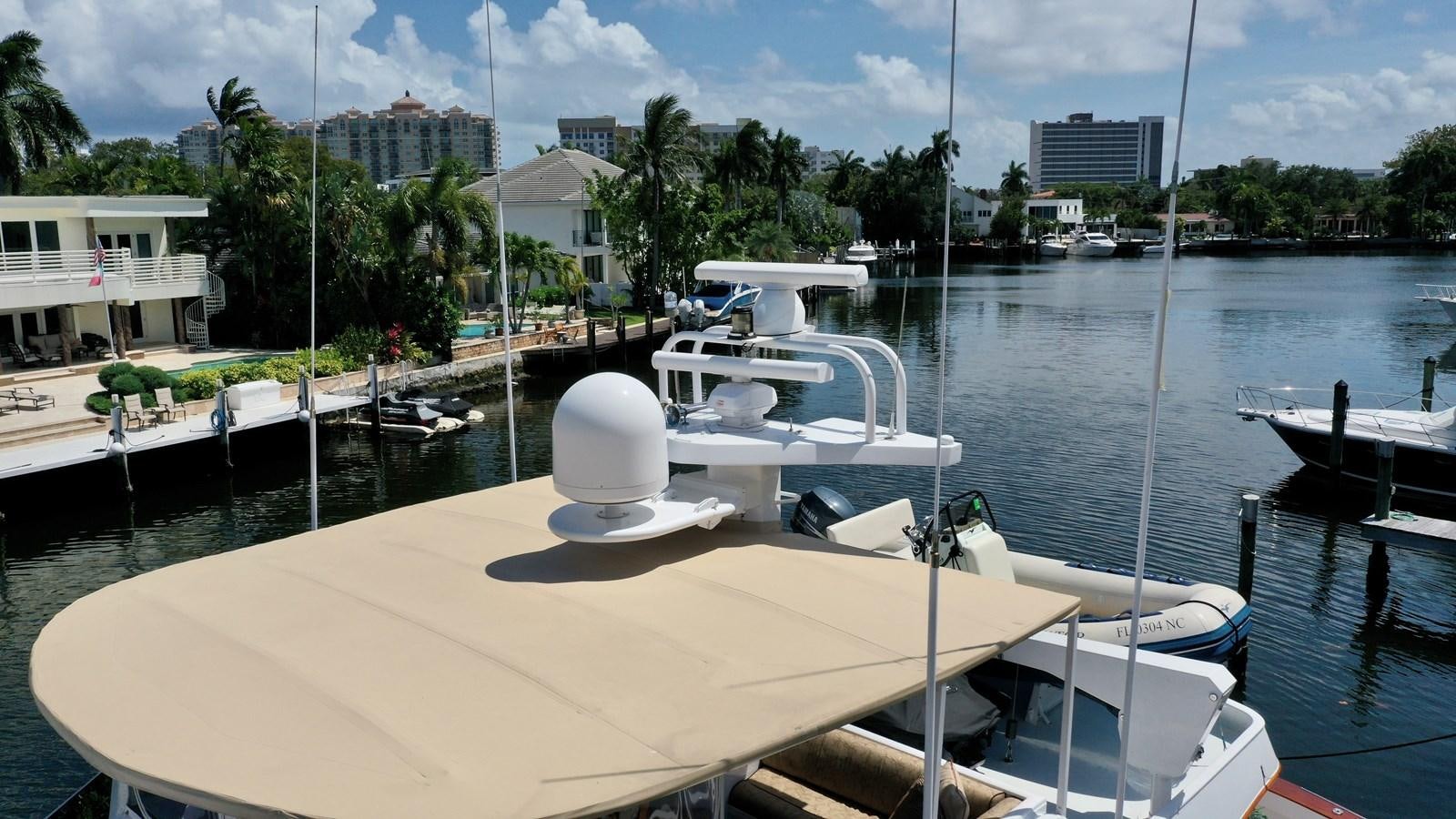 a group of boats in a harbor aboard CAPTIVATOR Yacht for Sale