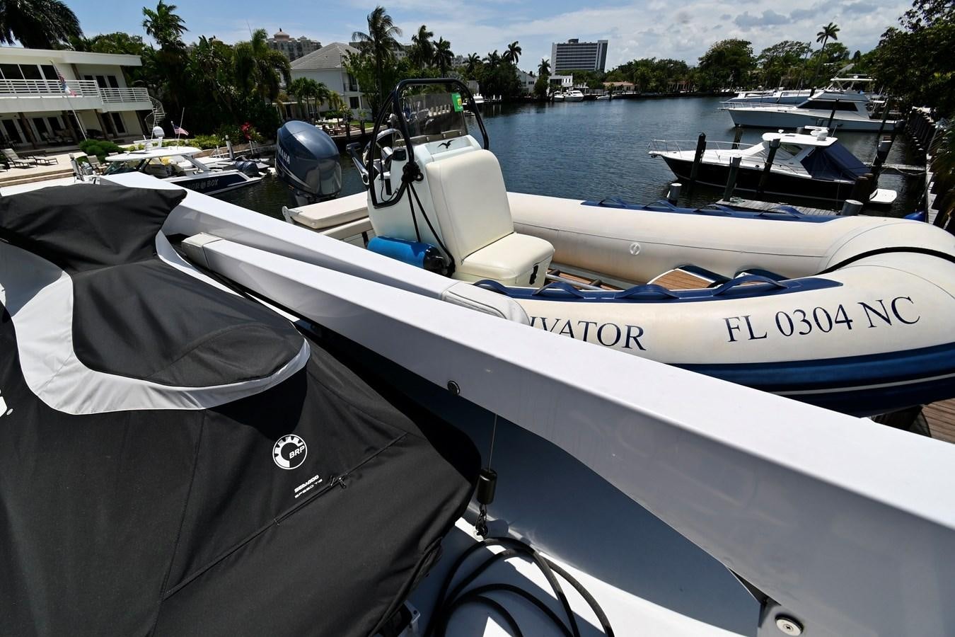 a boat with a motor aboard CAPTIVATOR Yacht for Sale